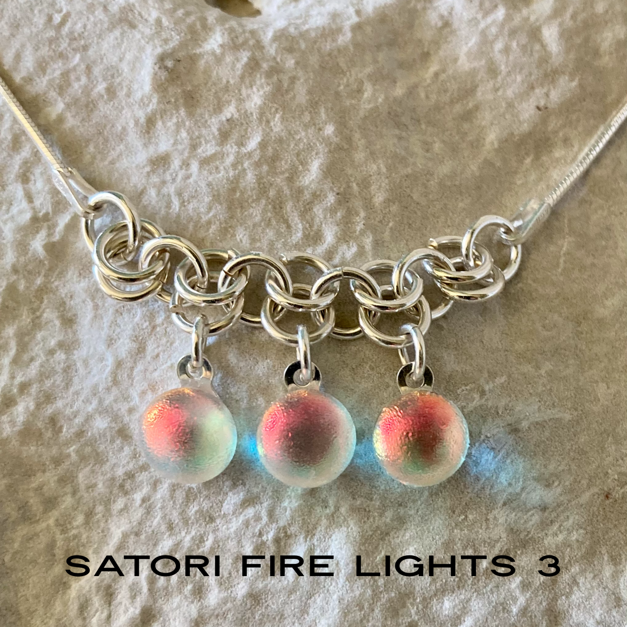 Satori Fire Lights 3 on Sterling Rings